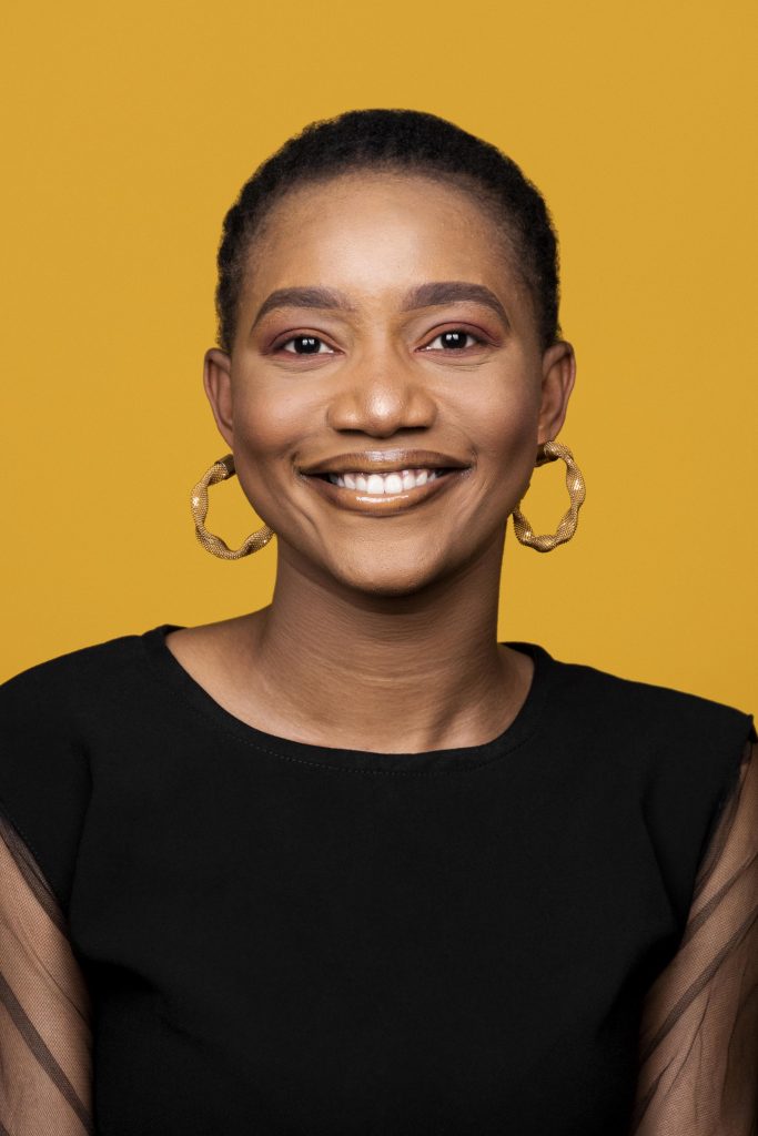 smiley african woman with golden earrings